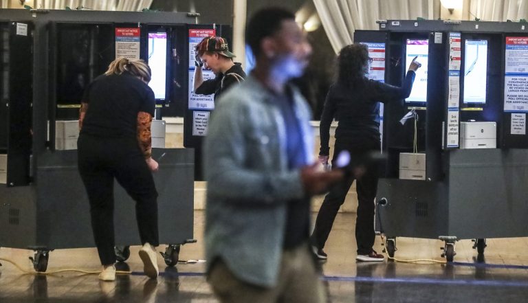 DOJ monitoring polls in four Georgia counties amid Warnock-Walker runoff