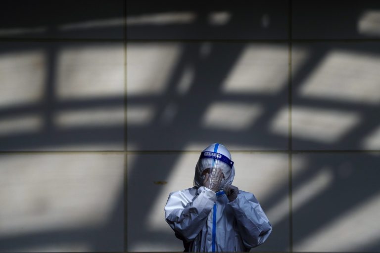 Facing COVID-19 surge, China expanding hospitals and ICUs