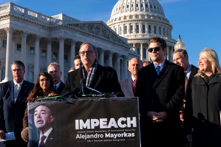 Rep. Andy Biggs, R-Ariz., a member of the conservative House Freedom Caucus, speaks with a group of Republican lawmakers calling for the impeachment Secretary of Homeland Security Alejandro Mayorkas because of illegal immigrants crossing the border from Mexico, Tuesday, Dec. 13, 2022, outside the Capitol in Washington. 