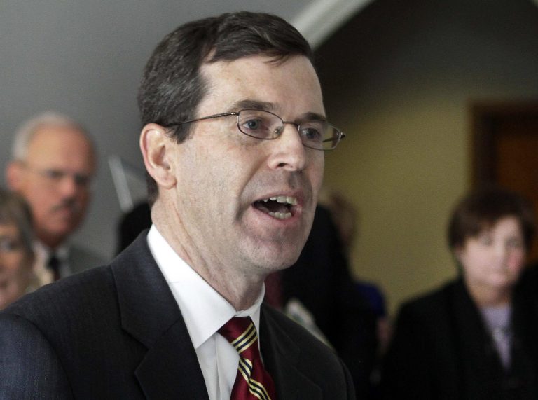 FILE - New Hampshire Attorney General Michael Delaney speaks about drug abuse issues in Concord, N.H., Feb. 22, 2013.