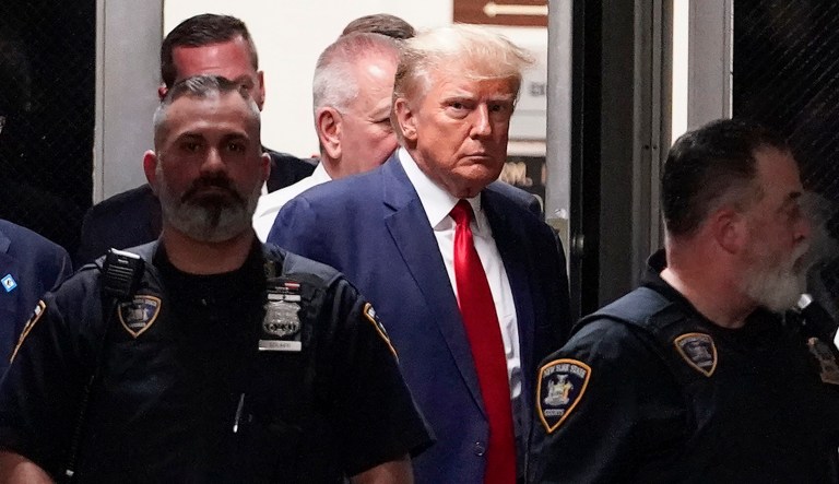 Former President Donald Trump arrives at court, Tuesday, April 4, 2023, in New York. 