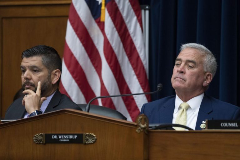 Rep. Brad Wenstrup, R-Ohio, then-chairman of the House Select Subcommittee on the Coronavirus Pandemic, joined at left by Rep. Raul Ruiz, D-Calif., the ranking member, makes closing remarks following testimony by Dr. Anthony Fauci, the former Director of the National Institute of Allergy and Infectious Diseases, at the Capitol in Washington, June 3, 2024. (AP Photo/J. Scott Applewhite)