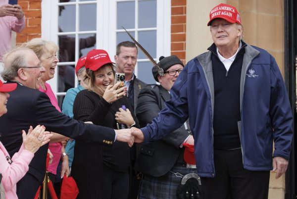Trump greeted by hat-waving crowd at Scotland golf resort