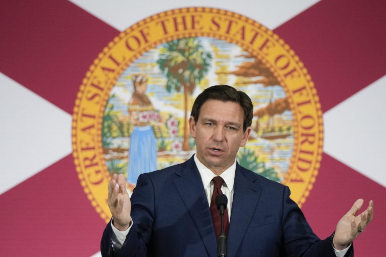 FILE - Florida Gov. Ron DeSantis speaks during a news conference to sign several bills related to public education and increases in teacher pay, in Miami, Tuesday, May 9, 2023. (AP Photo/Rebecca Blackwell)