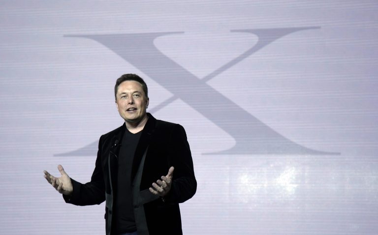 FILE - Elon Musk, CEO of Tesla Motors Inc., introduces the Model X car at the company's headquarters Tuesday, Sept. 29, 2015, in Fremont, California. (AP Photo/Marcio Jose Sanchez, File)