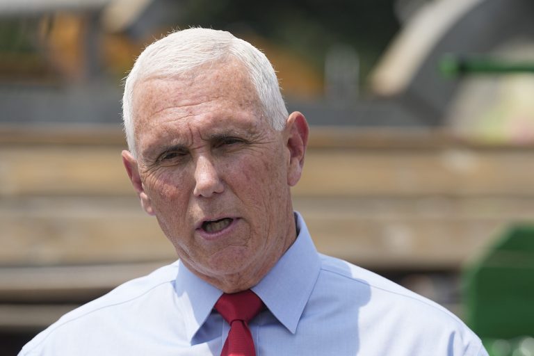 Republican presidential candidate and former Vice President Mike Pence speaks with the media during a stop at the Indiana State Fair, Wednesday, Aug. 2, 2023, in Indianapolis. 