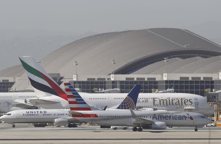 Aircraft await on the runway to take off at the Los Angeles International Airport in Los Angeles April, Apr. 30, 2014. The Trump administration is considering a flight ban if the coronavirus continues to spread.