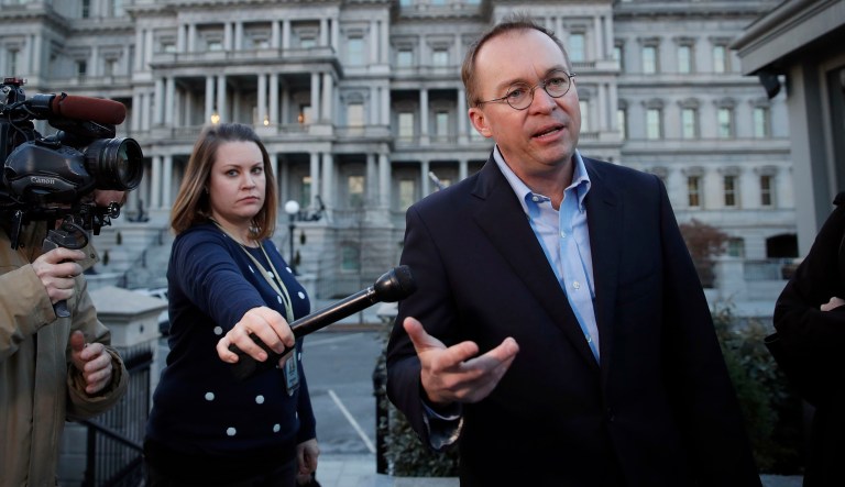 Director of the Office of Management and Budget Mick Mulvaney speaks with reporters at the White House, Saturday, Jan. 20, 2018, in Washington. (AP Photo/Alex Brandon)