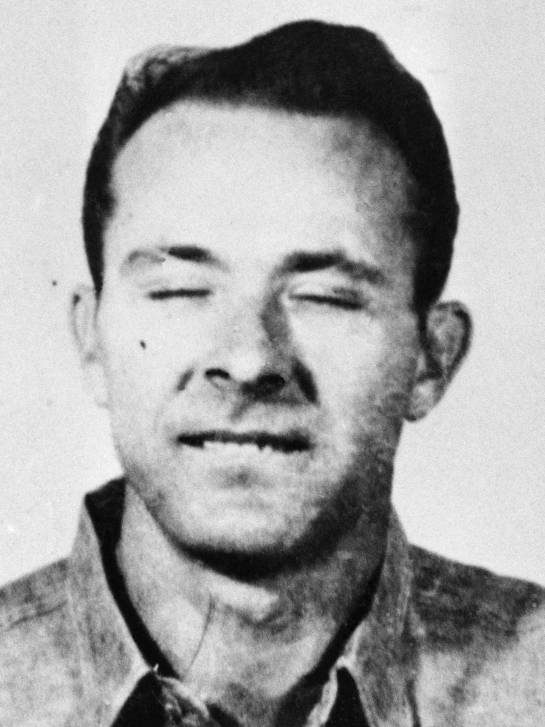   FILE - This 1962 file photo provided by the FBI shows Clarence Anglin 28, of Montgomery, Ala., in San Francisco. Anglin is a bank robber believed to have escaped from Alcatraz Island Federal Prison. Fifty years ago, three convicted bank robbers who had dug out of their Alcatraz cells with spoons boarded a tiny raft made of raincoats, pulling off an unlikely escape from The Rock that made its way into prison lore, a book and a movie. A lone U.S. marshal still is trying to find whether Clarence Anglin, John Anglin or Frank Morris survived the treacherous crossing of San Francisco Bay and are alive. (AP Photo/FBI, File)  
