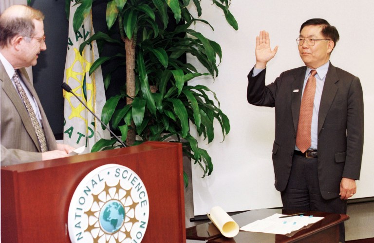 Professor Chang-Lin Tien (R) is sworn in as a National Science Board member by Neal Lane, White House Science and Technology Advisor, at the National Science Foundation building in Arlington, VA July 29, 1999. (Photo by Alex Wong)