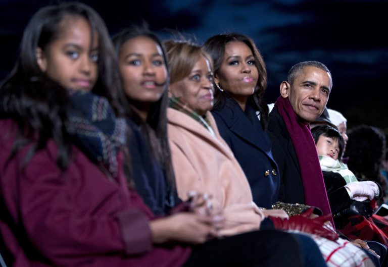 From right, President Obama, first lady Michelle Obama, Michelle's mother Marian Robinson, daughters Sasha, and Malia, look to the stage during the National Christmas Tree Lighting ceremony at the Ellipse in Washington, Thursday, Dec. 3, 2015. (AP Photo/Carolyn Kaster)