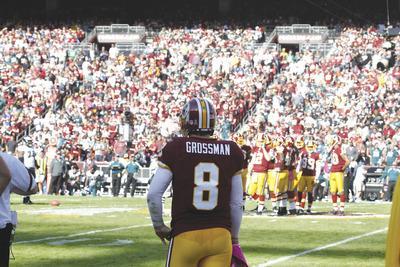 Jennifer Milbrett/The Washington Examiner
The Redskins'Rex Grossman threw four interceptions, which left him watching backup John Beck, 12, from the sideline in the fourth quarter of a loss to the Eagles on Sunday.