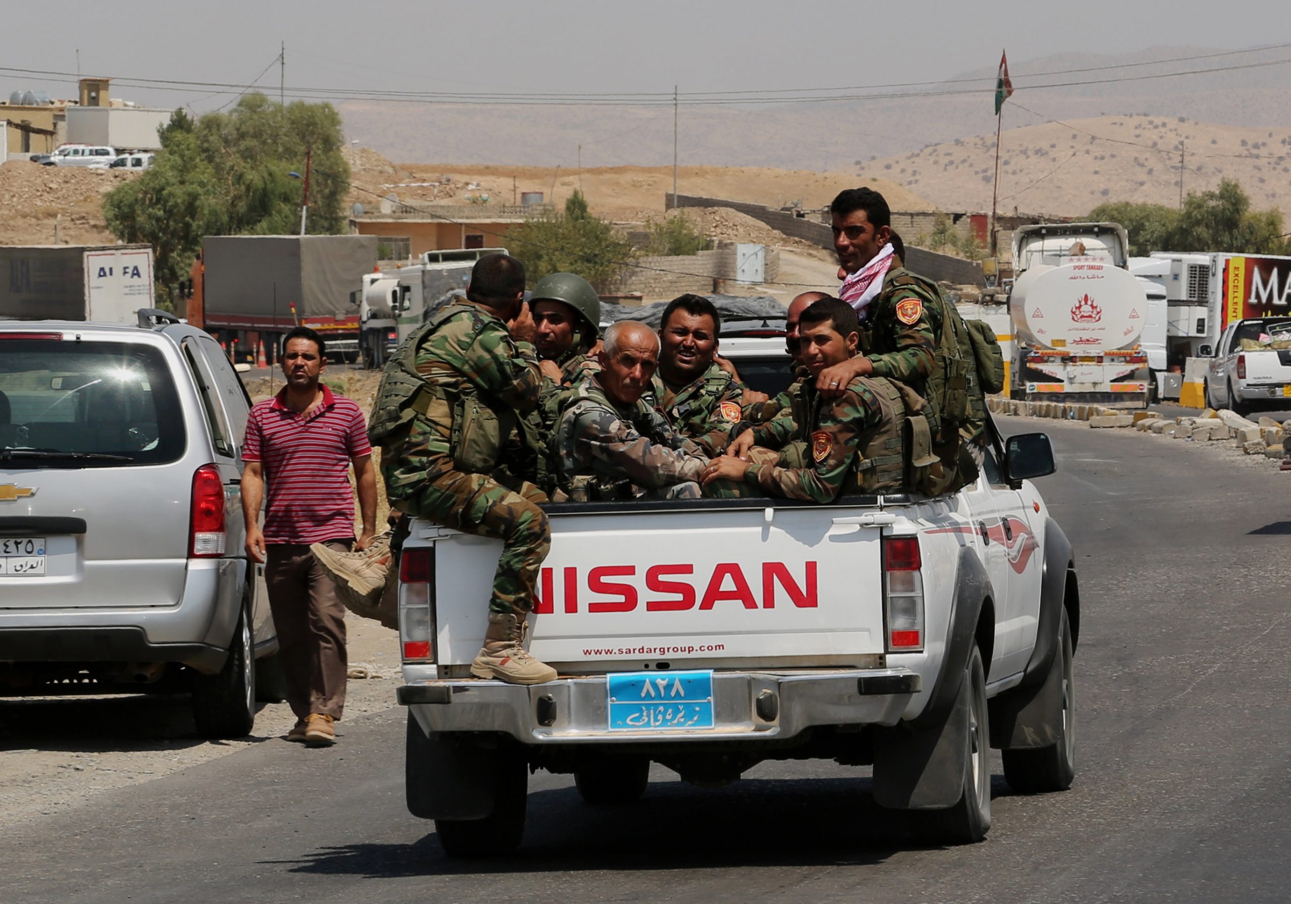 A buyer’s market at gun bazaar in Kurdish town