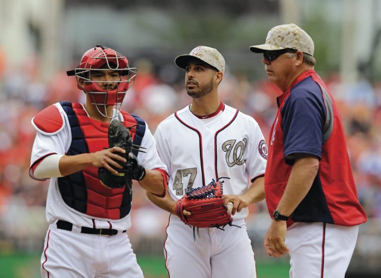 Alex Brandon/AP
Nats pitcher Gio Gonzalez, center, allowed four runs on eight hits and couldn't get out of the sixth inning against the Orioles on Monday.