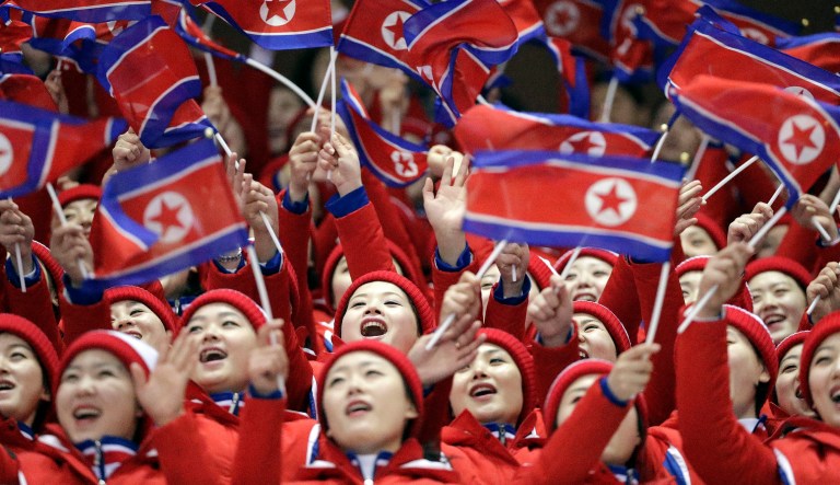 Supporters from North Korea cheer during the pair figure skating short program in the Gangneung Ice Arena at the 2018 Winter Olympics in South Korea. (AP Photo/David J. Phillip)