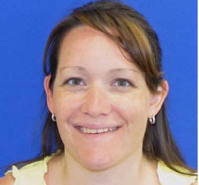 Teacher says she broke up fights, but didn’t choke students