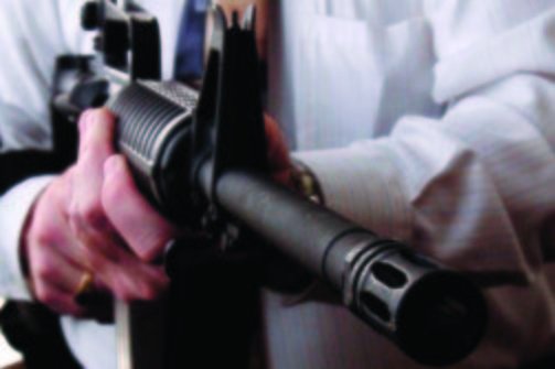 Sales of AR-15 semi-automatic rifles like this have surged since concerns of a federal ban surged after the Colorado Batman shootings. AP Photo