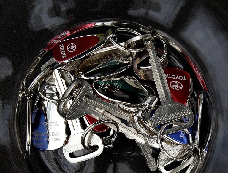 FILE - In this photo taken June 25, 2011, file photo, Toyota keys sit in a fish bowl at the Toyota of Tampa Bay dealership in Tampa, Fla. A plaintiffs' attorney on Wednesday, Dec. 26, 2012, says Toyota Motor Corp. has reached a settlement in a case involving hundreds of lawsuits over accelerations problems. Steve Berman said Wednesday the settlement, which still needs a federal judge's approval, was worth more than $1 billion and is the largest settlement in U.S. history involving automobile defects.