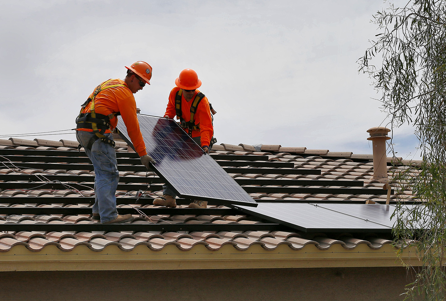 Greens settle fight with utility over solar rate hikes