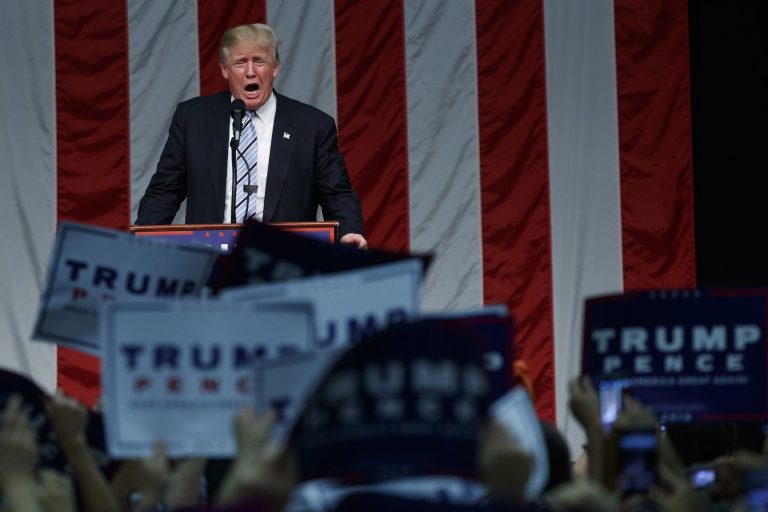 The Trump donation was given at a time when Bondi was reviewing whether she'd investigate Trump University. (AP Photo/Evan Vucci)