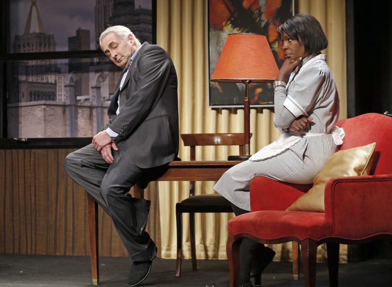   FILE - In this Nov.15, 2012 file photo, French actor Eric Debrosse acting as former International Monetary Fund leader Dominique Strauss-Kahn, left, and actress Jelle Saminnadin acting as Nafissatou Diallo, the hotel housekeeper, who accused Dominique Strauss-Kahn of sexually assaulting her, pose during a photo opportunity as they perform in a play 