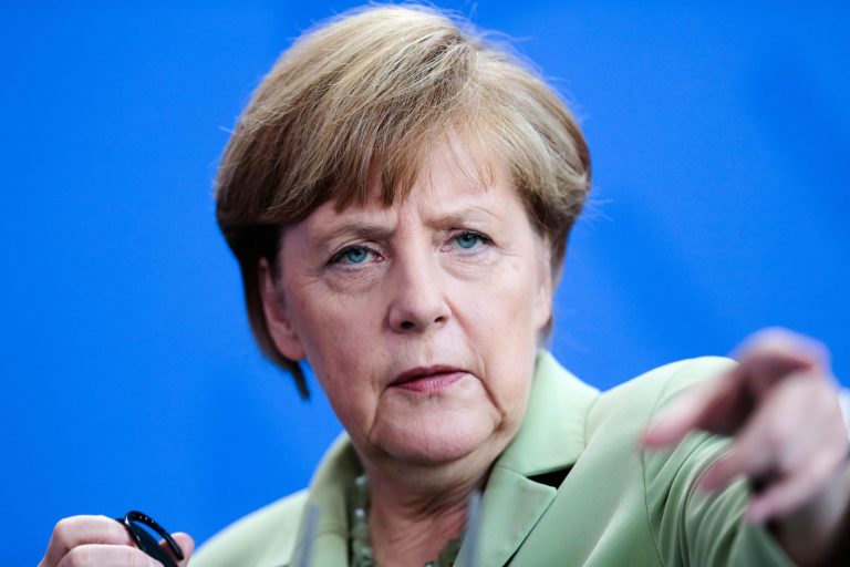 German Chancellor Angela Merkel points to select a journalist for questions during a news conference with Tunisian Prime Minister Mehdi Jomaa after a meeting at the chancellery in Berlin, Wednesday, June 18, 2014. (AP Photo/Markus Schreiber)