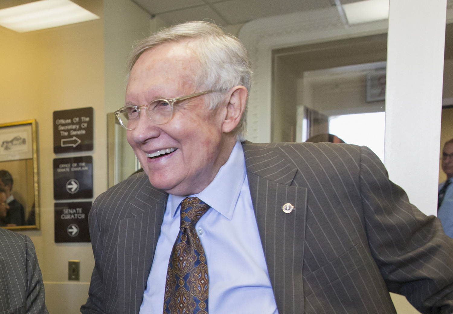 Reid praises London’s Muslim mayor, bashes Trump