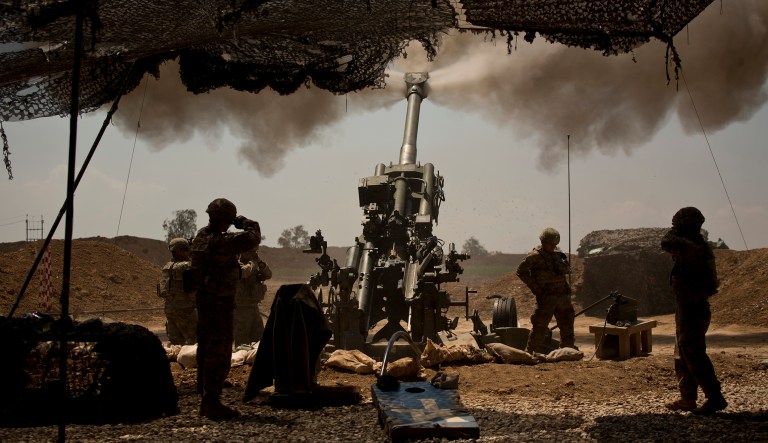 U.S. soldiers from the 82nd Airborne Division fire artillery in support of Iraqi forces fighting Islamic State militants from their base east of Mosul. The top U.S. commander in Iraq says Iraqi Security Forces now have Mosul 