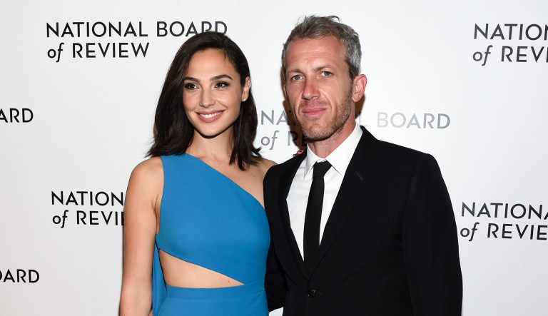 In this photo from Tuesday, Israeli actress Gal Gadot, pictured left, and husband Yaron Versano attend the National Board of Review Awards Gala at Cipriani 42nd Street in New York. Meanwhile, Gadot's dress caused an uproar in Lebanon after the dress' Lebanese designer, Elie Saab, posted a photo on Instagram. (Photo by Evan Agostini/Invision/AP)