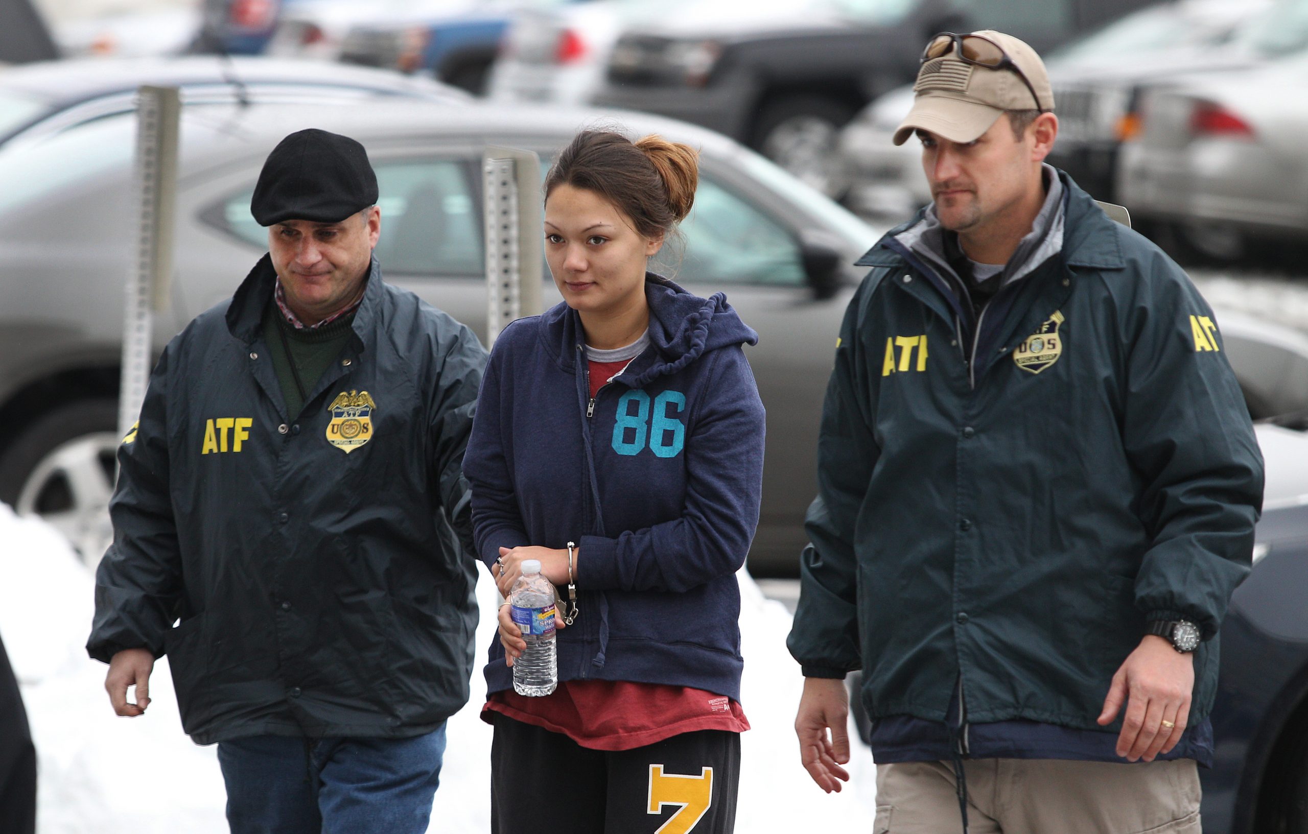 Woman charged in New York firefighter slayings