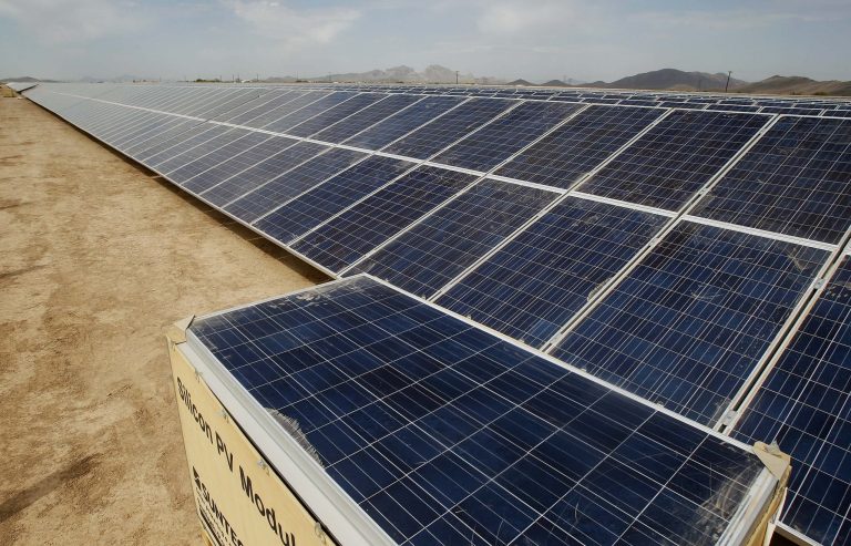 The debate over whether Arizona should reduce the benefit that electricity customers receive for selling power from rooftop solar arrays is hitting the airwaves. (AP Photo)