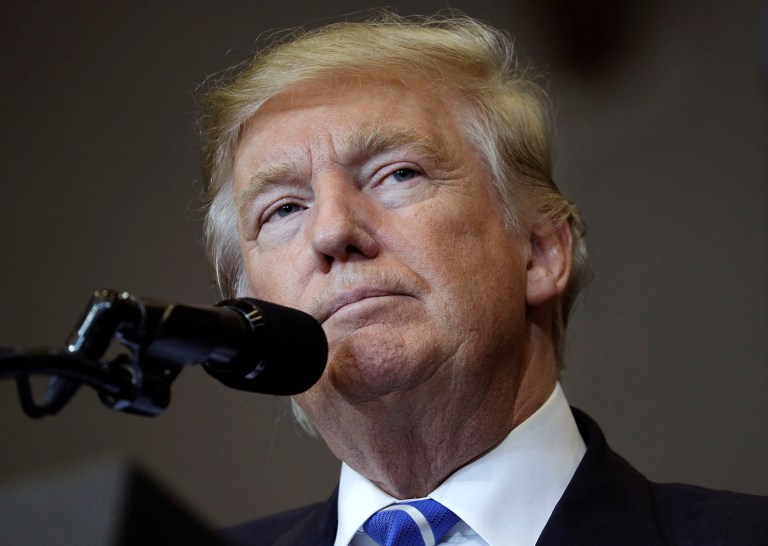 Donald Trump's luxury hotel and casino company violated the U.S. trade embargo against Cuba by doing business on the communist Island under the Fidel Castro's presidency. (AP Photo/John Locher)