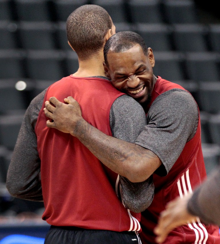   Miami Heat's LeBron James, right, hugs teammate Shane Battier during basketball practice Wednesday, June 13, 2012, in Oklahoma City. Game 2 of the NBA finals between the Heat and the Oklahoma City Thunder is Thursday. (AP Photo/Sue Ogrocki)  
