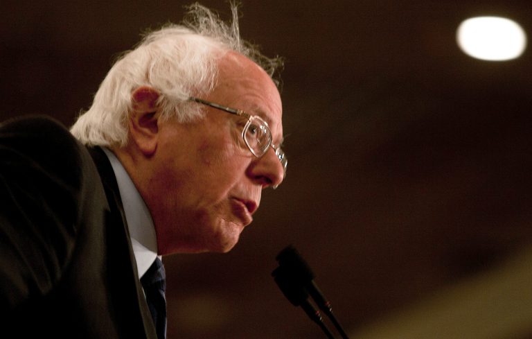 Donald Trump is encouraging Bernie Sanders to run against Hillary Clinton on a third-party ticket. (AP Photo/Bruce Crummy)