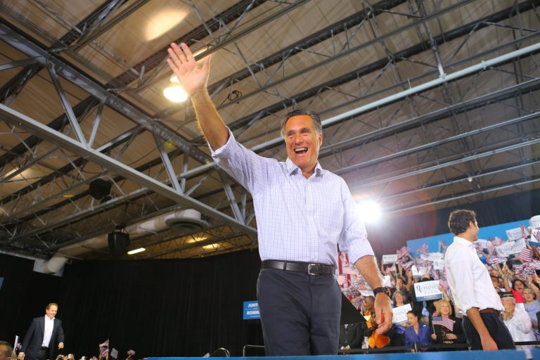 MIAMI, FL - SEPTEMBER 19:  Republican presidential candidate, former Massachusetts Gov. Mitt Romney waves to supporters during a Juntos Con Romney Rally at the Darwin Fuchs Pavilion, on September 19, 2012 in Miami, Florida. Romney continues to campaign for votes around the country.  (Photo by Joe Raedle/Getty Images)