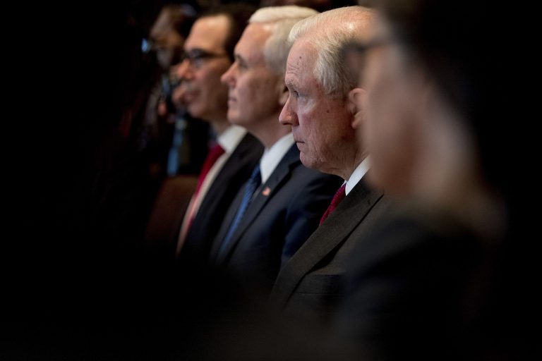 From left, Treasury Secretary Steve Mnuchin, Vice President Mike Pence, and Attorney General Jeff Sessions, listen as President Donald Trump speaks during a meeting with his Cabinet in the Cabinet Room at the White House in Washington, Monday, March 13, 2017. (AP Photo/Andrew Harnik)