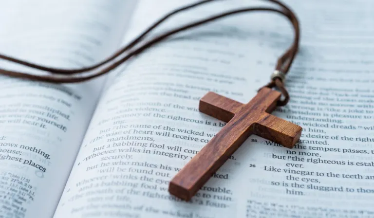 bible on a cross