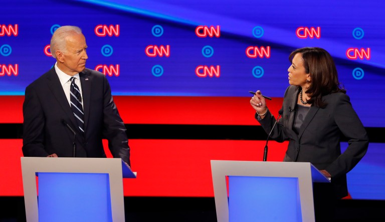 Former Vice President Joe Biden listens as Sen. Kamala Harris, D-Calif., speaks during the second of two Democratic presidential primary debates hosted by CNN Wednesday, July 31, 2019, in the Fox Theatre in Detroit.