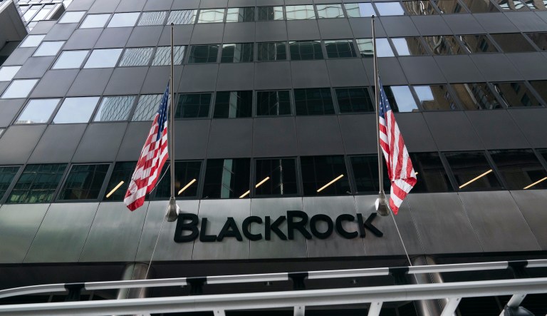 Flags fly on the front of BlackRock headquarters, Wednesday, Jan. 13, 2021, in New York. The financial asset manager reports earnings Thursday, Jan. 14.