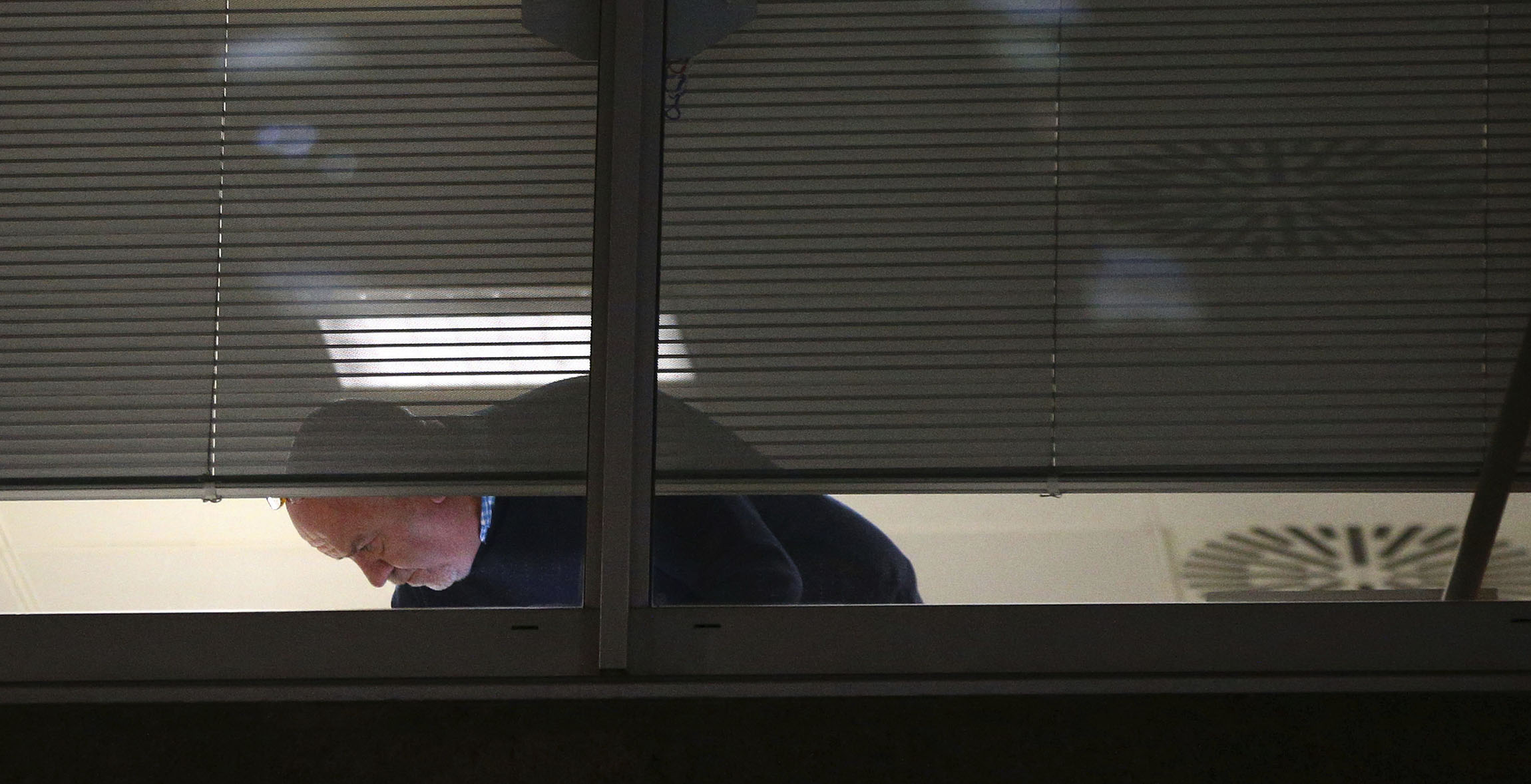 British police raid Cambridge Analytica’s London office