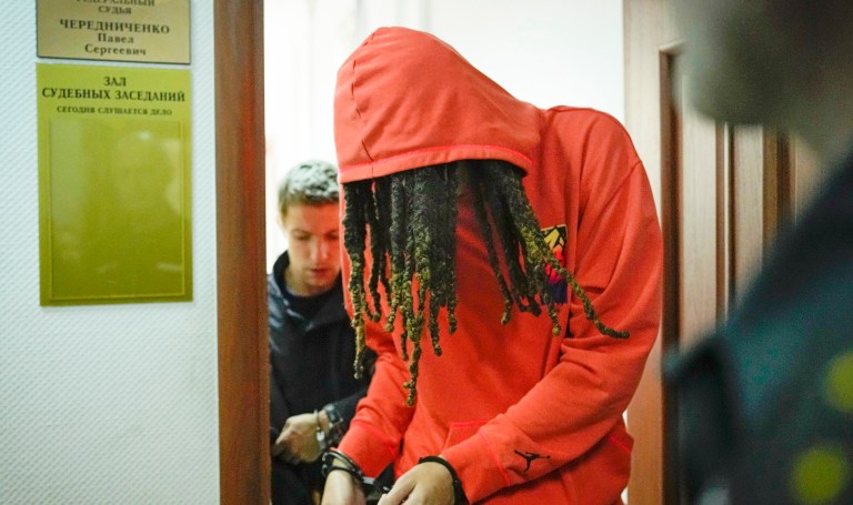 WNBA star and two-time Olympic gold medalist Brittney Griner is escorted to a courtroom for a hearing in Khimki, just outside Moscow, Russia, on Monday, June 27, 2022. Griner is to appear in court Monday for a preliminary hearing ahead of her trial.