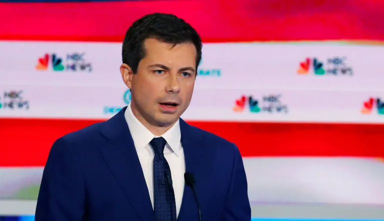 Democratic presidential candidate South Bend Mayor Pete Buttigieg, left, speaks during the Democratic primary debate hosted by NBC News at the Adrienne Arsht Center for the Performing Arts, Thursday, June 27, 2019, in Miami, as former vice president Joe Biden.