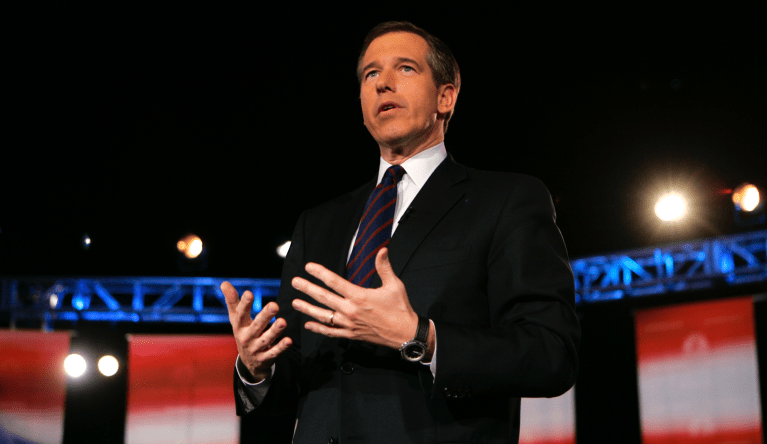 NBC's Brian Williams speaks to the crowd during a debate between Democratic presidential hopefuls Sen. Barack Obama, D-Ill., and Sen. Hillary Rodham Clinton, D-N.Y., Tuesday, Feb. 26, 2008 in Cleveland. (AP Photo/Mark Duncan)