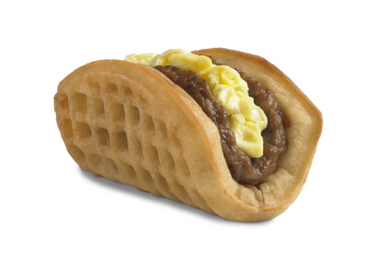 This undated product image provided by Taco Bell, shows the company's new waffle taco.  The fast-food chain says the waffle taco, which includes scrambled eggs, sausage and a side of syrup, was the top seller during breakfast hours at the five Southern California restaurants where they were tested earlier this year. (AP Photo/Taco Bell)