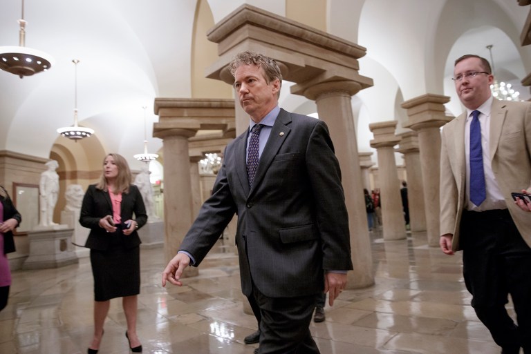 Sen. Rand Paul, R-Ky., a member of the Senate Health, Education, Labor, and Pensions Committee, walks to a room on Capitol Hill on Thursday where he charges House Republicans are keeping their Obamacare repeal and replace legislation under lock and key and not available for public view. (AP Photo/J. Scott Applewhite)