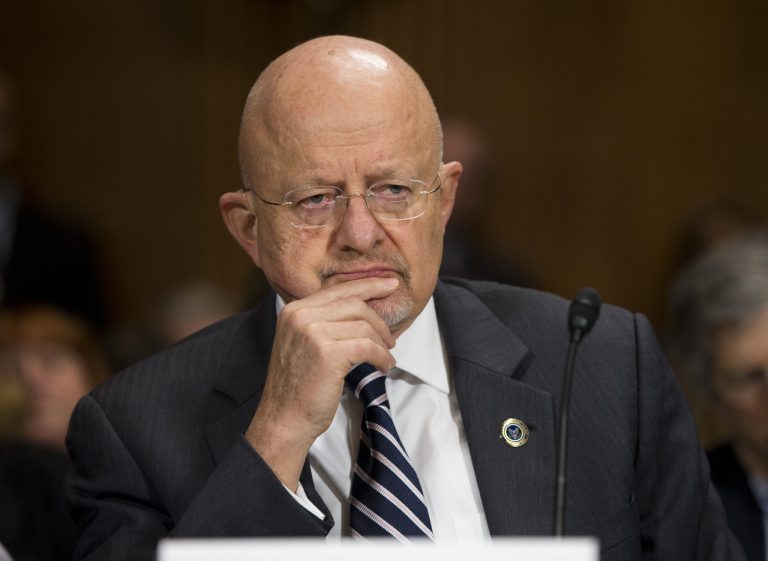 National Intelligence Director James Clapper pauses during a Senate Judiciary Committee oversight hearing on the Foreign Intelligence Surveillance Act on Capitol Hill on Wednesday, Oct. 2, 2013 in Washington. U.S. intelligence officials say the government shutdown is seriously damaging the intelligence communityÃ¢â¬â¢s ability to guard against threats. (AP Photo/ Evan Vucci)