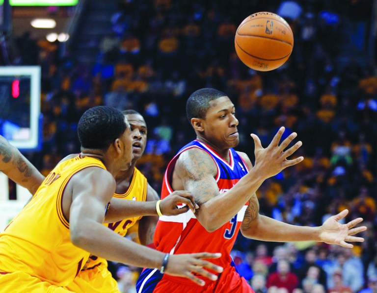 Mark Duncan/AP
Rookie Bradley Beal had eight points in his debut, but the Wizards dropped their season-opener on Tuesday night.