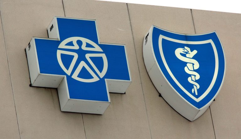 Blue Cross Blue Shield told city workers in a small Kansas town that their group health care plan would no longer be available due to the health care law.ÃÂ (AP Photo/Carlos Osorio)