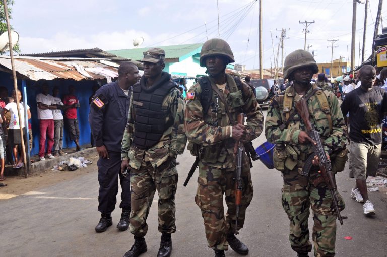 Liberian slums barricaded as Ebola sets new record