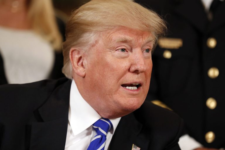 Six in 10 people say the economy has improved under President Trump, and 38 percent give him some credit for it. (AP Photo/Alex Brandon)